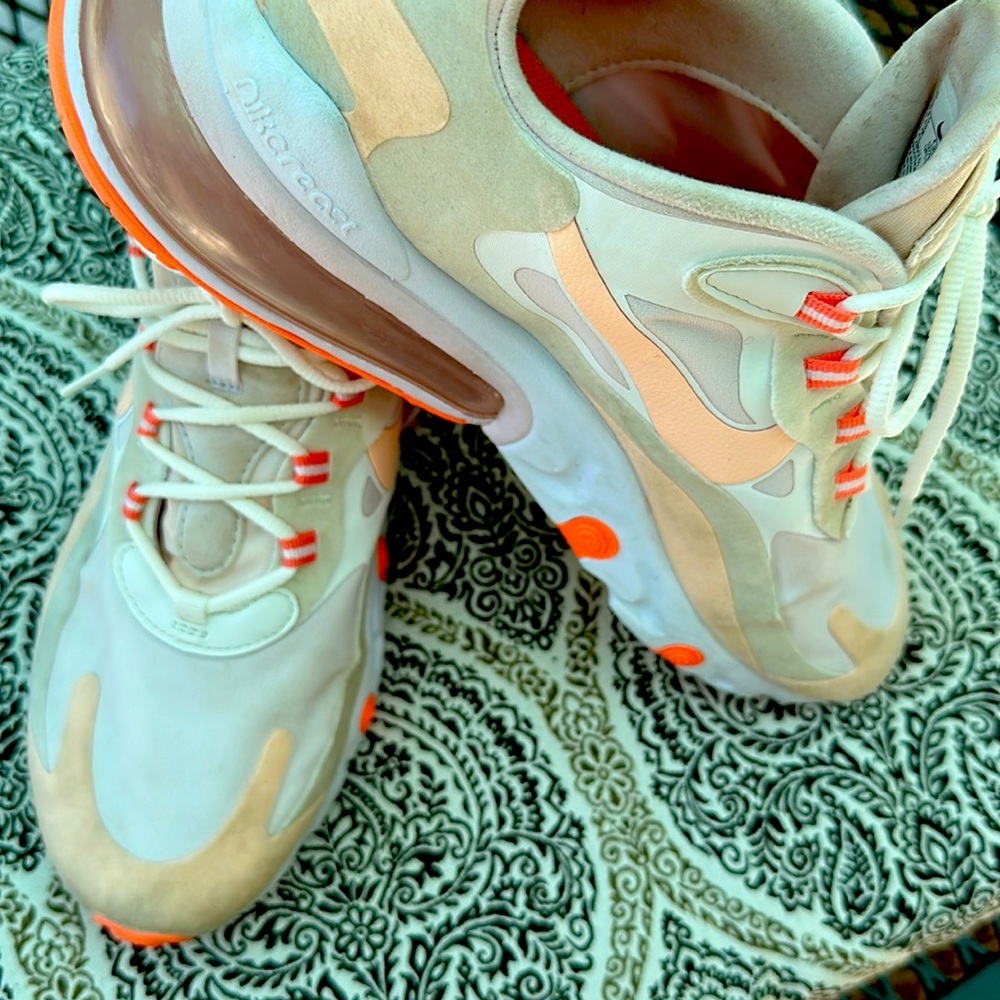 Women’s Nike Air7c size 11 light orange/peach color.